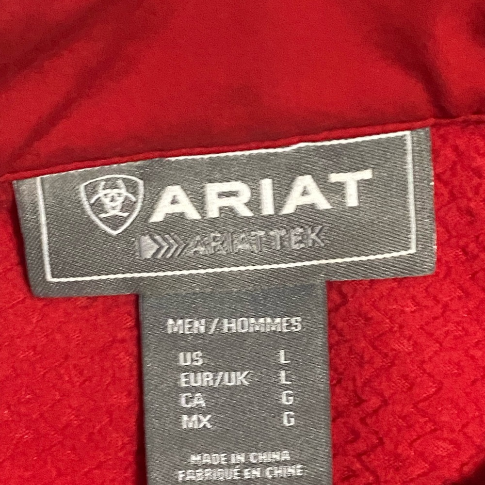 Red and Ariat windbreaker
